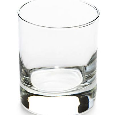 empty whisky or whiskey glass isolated on a white background